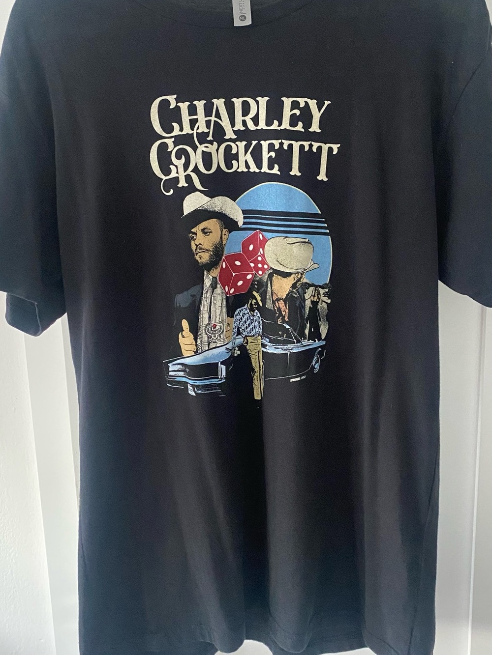 Next Level Apparel Black Charley Crockett Graphic Tee with Blue & Red Accents